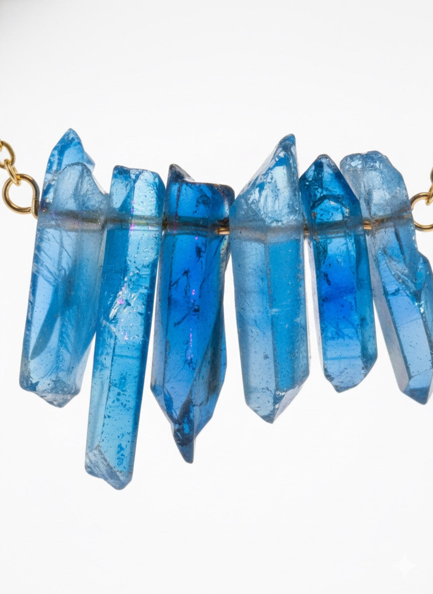 Angel aura quartz crystal point necklace - close up showing rainbow iridescence and colors