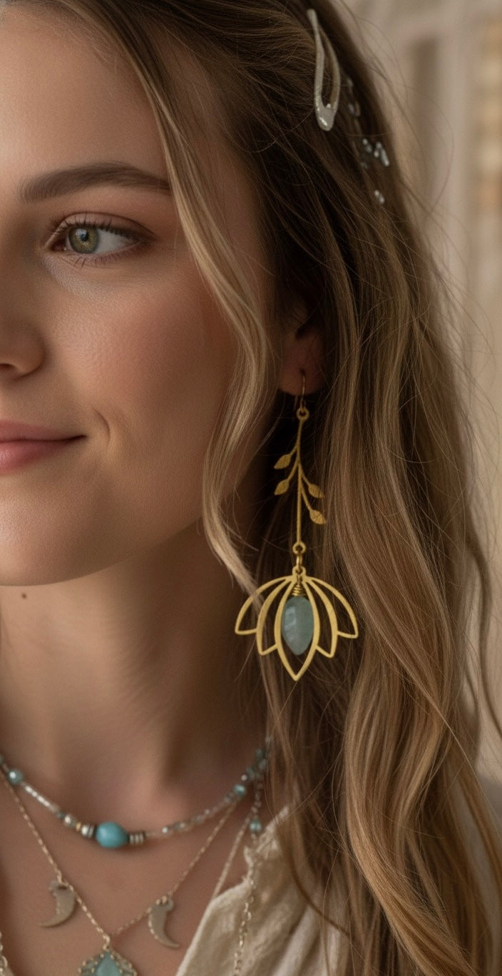 Aquamarine leaf earrings close up - lightweight gold filled March birthstone earrings