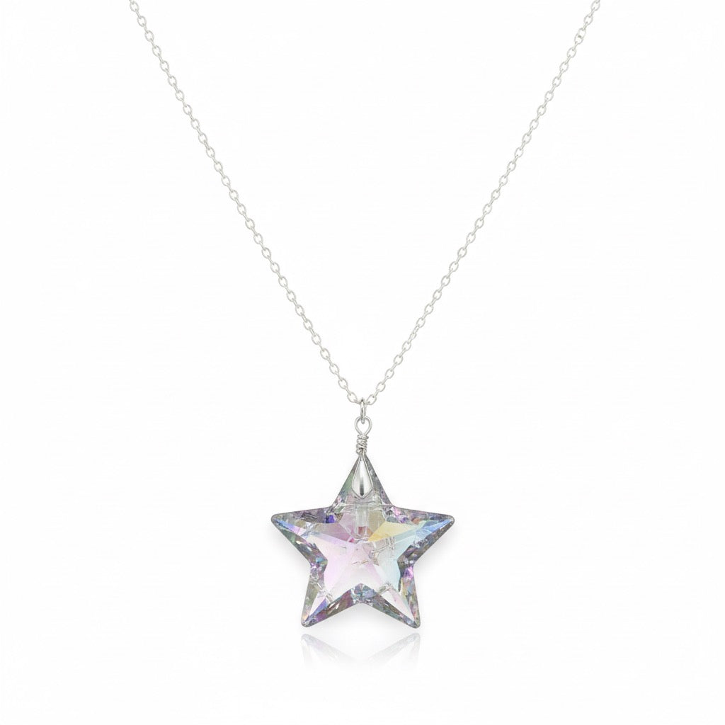 Close up of angel aura opalite star pendant with rainbow iridescence