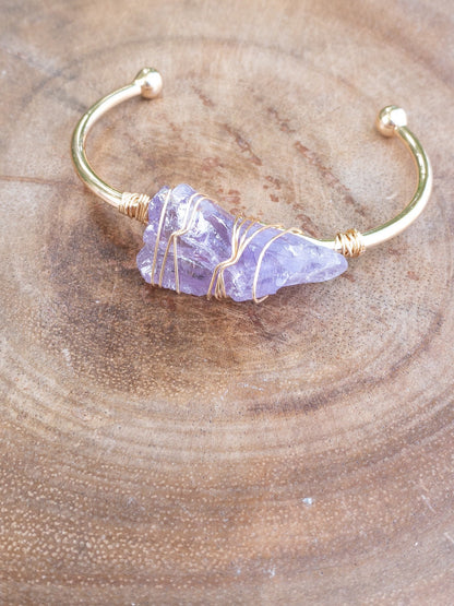 Close up of rose quartz gemstone wire wrapped bracelet showing tarnish resistant copper wire detail