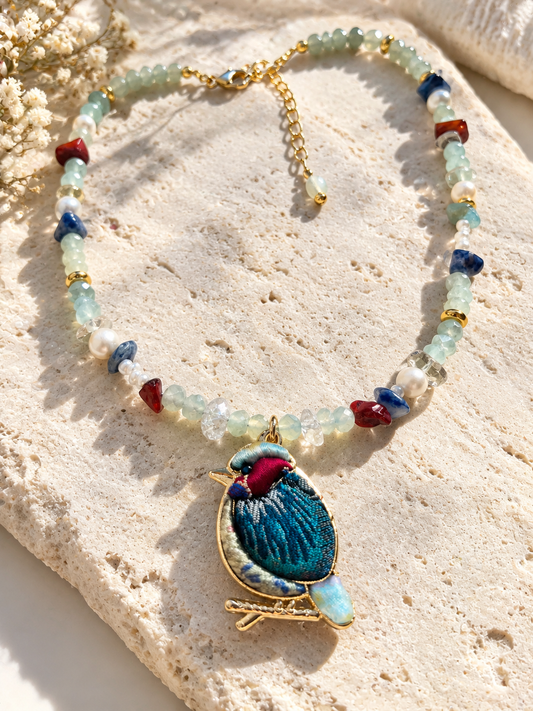 Handmade beaded necklace with freshwater pearls and colorful natural stone beads