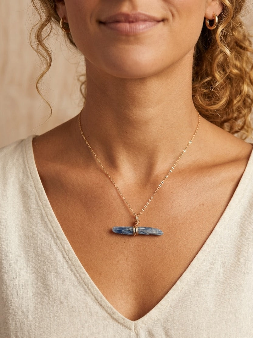 Natural blue kyanite stone pendant close-up, wire wrapped gemstone necklace