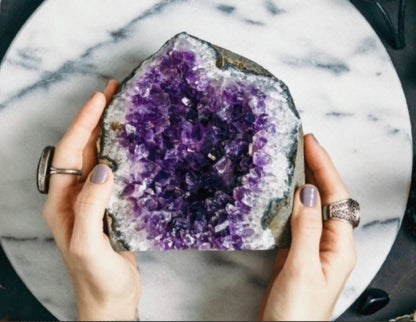 Natural gemstone bracelet lifestyle shot - rose quartz and amethyst healing crystal jewelry