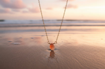 Natural sunstone necklace close-up - dainty golden gemstone pendant hypoallergenic jewelry