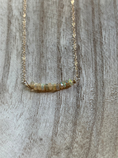 Opal necklace on model, delicate gold filled gemstone jewelry