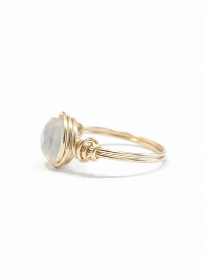 Rainbow moonstone ring close up - AAA moonstone cushion cut with blue flash