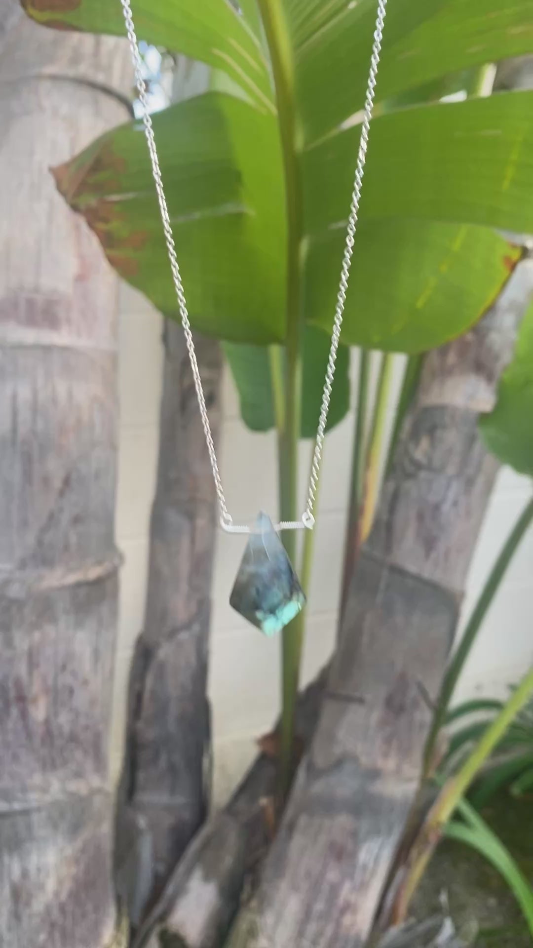 Natural labradorite pendant necklace - raw crystal point with rainbow iridescence